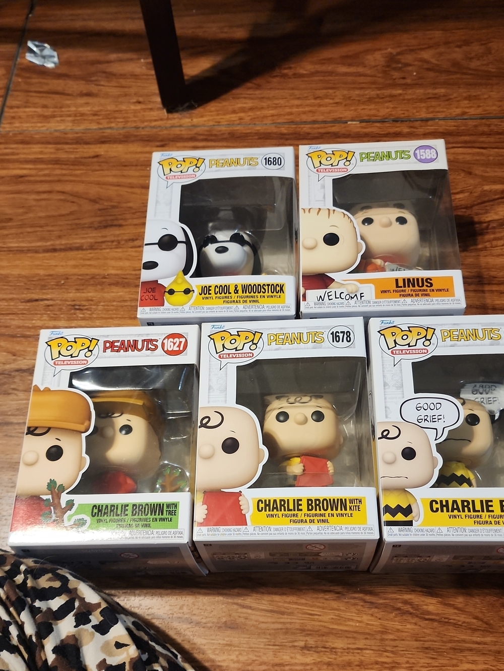 Funko Peanuts Charlie Brown & Friends Vinyl Figures - White, Yellow, Black, Red